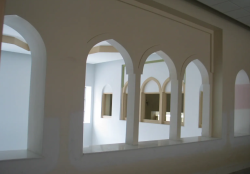 Artisans painting the interior arches. Photo: ISBCC Tanvir Collection.